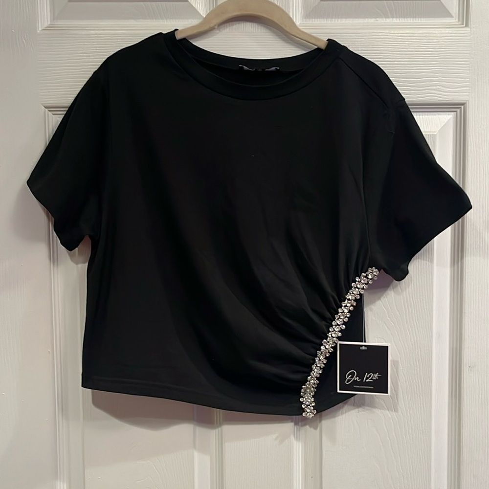 On 12th brand size L pullover short sleeve tee with embellishments. NWT.